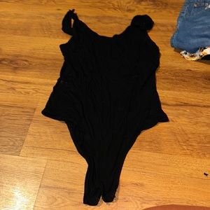 Black bodysuit. Very comfortable fitting.